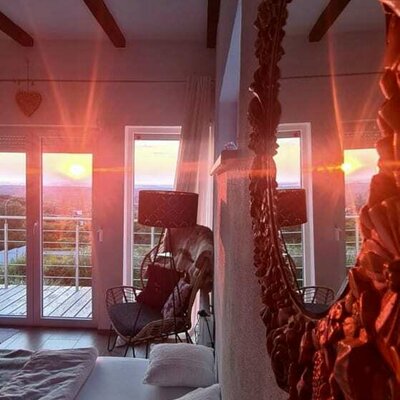 Schlafzimmer mit Sonnenuntergang